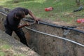 Muadzam Shah, Malaysia- September 1st, 2021 :Plumber installing new HDPE pipe in the main drains