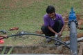 Muadzam Shah, Malaysia- September 1st, 2021 :Plumber installing new HDPE pipe in the main drains