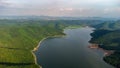 Muak Lek reservoir in Saraburi from aerial bird eye view. Beautiful unseen nature at Muak Lek dam with roadway beside with water a