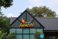Logo of Cafe Amazon coffee shop with nature environment with blue sky background. Cafe Amazon is a famous Thai franchise coffee