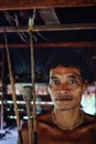 Tribal elder Toikots son Aman preparing for a hunt in the jungle