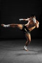 Muay Thai male fighter in actions