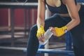 Muay Thai woman and Healthy concept. Boxer drink water during exercise break. Boxing Women prepare to train session and kickboxing Royalty Free Stock Photo