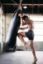 Muaythai kickboxing of punching bag