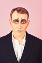 He is much of an actor. Mime with face paint. Mime artist. Man with mime makeup. Theatre actor miming. Stage actor