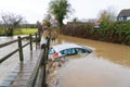 Car submerged in a flooded ford in Much Hadham. UK Royalty Free Stock Photo