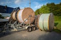 much large reels with fiber optic cables stand on a square Royalty Free Stock Photo