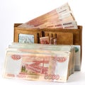 Much russian money rubles in wallet. Isolated object on white.