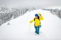 So much snow during a snowshoe walk of a lonely girl in the mountains Royalty Free Stock Photo