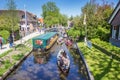 Much traffic in the historic canal of Giethoorn