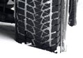 Mud all-terrain tire tread packed with snow stock photo Royalty Free Stock Photo