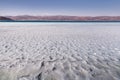 Mud baths and silt in the water of lake Salda in Turkey. Concept of river shallowing or therapeutic and rheumatological Royalty Free Stock Photo