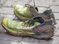 Mud covered running shoes