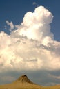 Mud crater and clouds Royalty Free Stock Photo