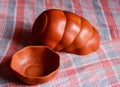 Mud crockery in blurred background