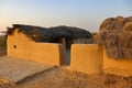 Mud house with thatched roof in an village in Rajasthan India Royalty Free Stock Photo