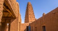 Mud houses and mosque in the Agadez village of Niger Royalty Free Stock Photo