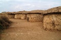 Mud hut in traditional masai village in Africa. Kenya. Masai Mara Royalty Free Stock Photo