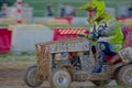 Mud spattered Lawn Mower Racing Royalty Free Stock Photo