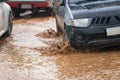 Mud splash by a car as it goes through flood water Royalty Free Stock Photo