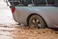 Mud splash by a car as it goes through flood water Royalty Free Stock Photo