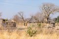 Mud straw and wooden hut with thatched roof in the bush. Local village in the rural Caprivi Strip, the most populated region in Na Royalty Free Stock Photo