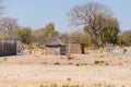 Mud straw and wooden hut with thatched roof in the bush. Local village in the rural Caprivi Strip, the most populated region in Na Royalty Free Stock Photo