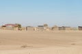 Mud straw and wooden hut with thatched roof in the bush. Local village in the rural Caprivi Strip, the most populated region in Na Royalty Free Stock Photo