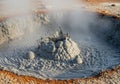 Mud volcano with bubbling grey mud Royalty Free Stock Photo