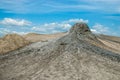 Mud volcano cone and blue sky contrast