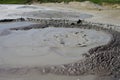 Bubbling mud. Mud volcano - landmark attraction in Buzau, Romania