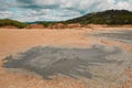 Mud volcano erupting with dirt, vulcanii Noroiosi in Buzau, Romania. Cracks, eruption.