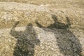 Mud volcano - two human shadows on texture in Buzau country Royalty Free Stock Photo