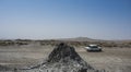 The mud volcanoes of gobustan with a Lada, Azerbaijan Royalty Free Stock Photo