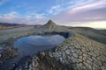 Bubbling mud. Mud volcano landscape at sunset - landmark attraction in Buzau, Romania