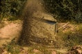 Mud and water splash in off-road racing. Tires in preparation for race. Mud and water splash in off the road racing