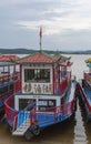 A touring boat on Jingbo Lake in Heilongjiang, China. Wetland and Mountain landscape