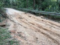 Muddy Dirt road of Uphill climb are barrier made problems of Travel