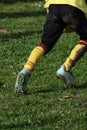 muddy football field with muddy player