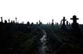 muddy night path in a spooky abandoned cemetery graveyard at night. dark fantasy misty and foggy vast landscape.