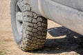 Muddy off-road tire with rough tread for 4x4.