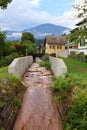 Muddy rainwater stream in Millstatt am See, Austria