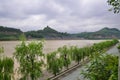 Muddy River Running Through City Royalty Free Stock Photo