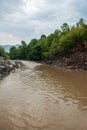 Muddy river at summer season Royalty Free Stock Photo