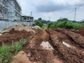 Muddy Road Construction under Cloudy Sky Royalty Free Stock Photo