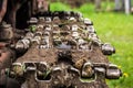 muddy rusty agricultural tractor wheels with steel tracks in mud Royalty Free Stock Photo