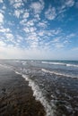 Muddy sand dark brown beach