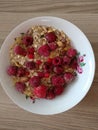 Muesli ball with raspberrys for breakfast