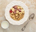 Muesli with banana, grapes and milk. healthy Breakfast. Royalty Free Stock Photo