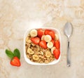 Muesli with bananas and strawberries Royalty Free Stock Photo